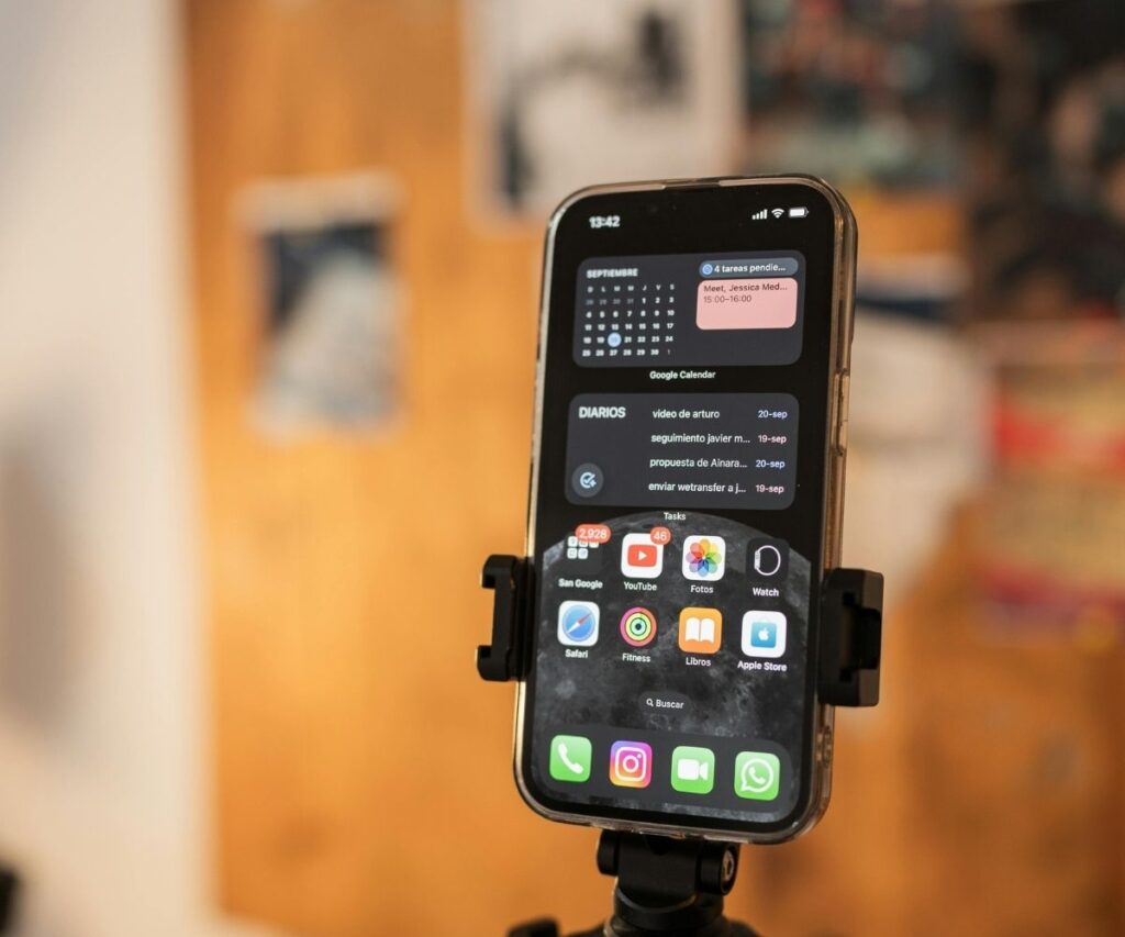 Iphone sitting on tripod.